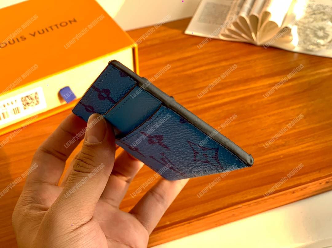 Louis Vuitton® Double Card Holder Monogram Radiant Sun. Size in