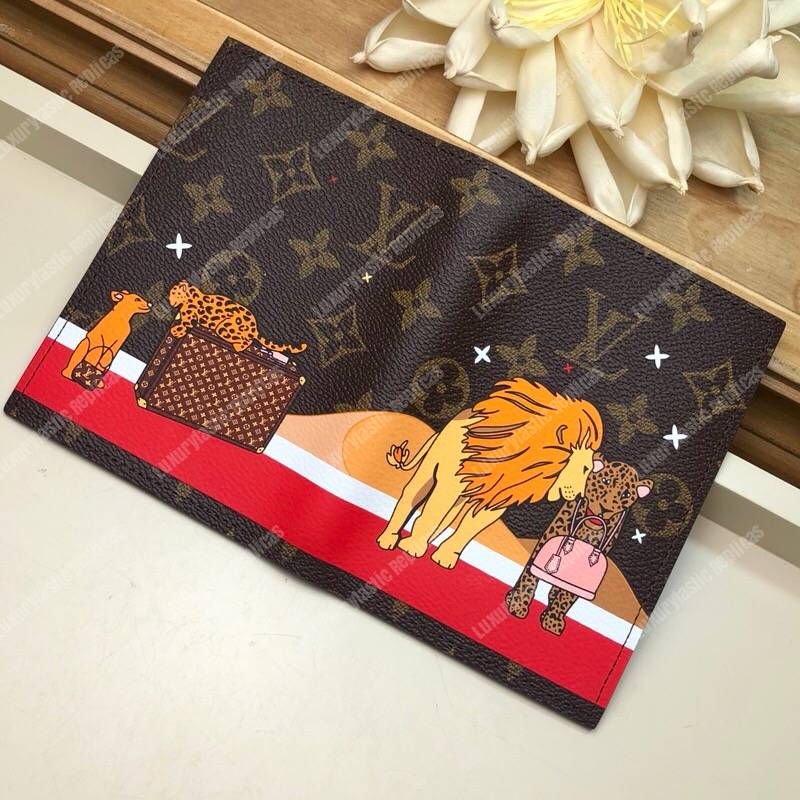 New in Box Louis Vuitton Limited Edition Lions Ghepards Pouchette